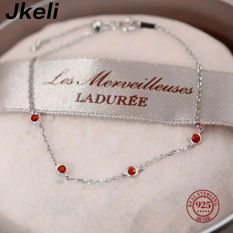 Jkeli 925 Sterling Silver Four Round Mini Ruby Zircon Bracelet for Women Fashion Niche Light Luxury Exquisite Chain Bracelet