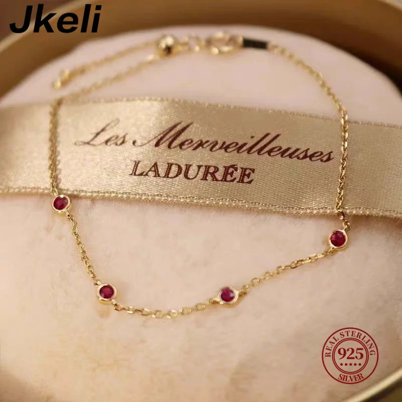 Jkeli 925 Sterling Silver Four Round Mini Ruby Zircon Bracelet for Women Fashion Niche Light Luxury Exquisite Chain Bracelet