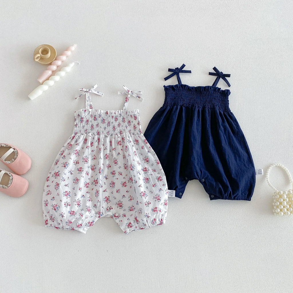 2026 New Summer 0-2Y Baby Clothes Fresh Floral/Solid Color Girls Romper with Bow Sling Smocked Elastic Waist Jumpsuit
