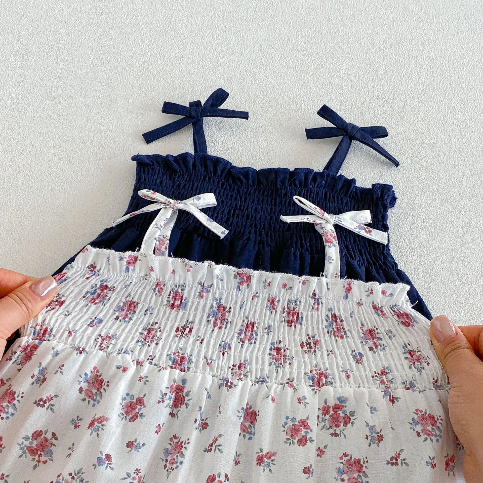2026 New Summer 0-2Y Baby Clothes Fresh Floral/Solid Color Girls Romper with Bow Sling Smocked Elastic Waist Jumpsuit